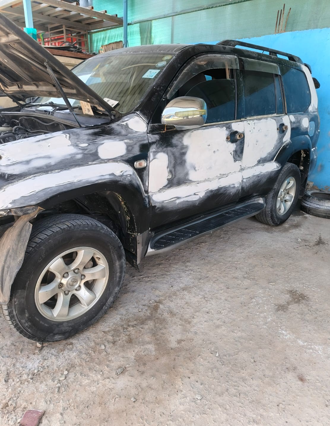 Full Body Panel Repair & Repaint — Toyota Prado — before