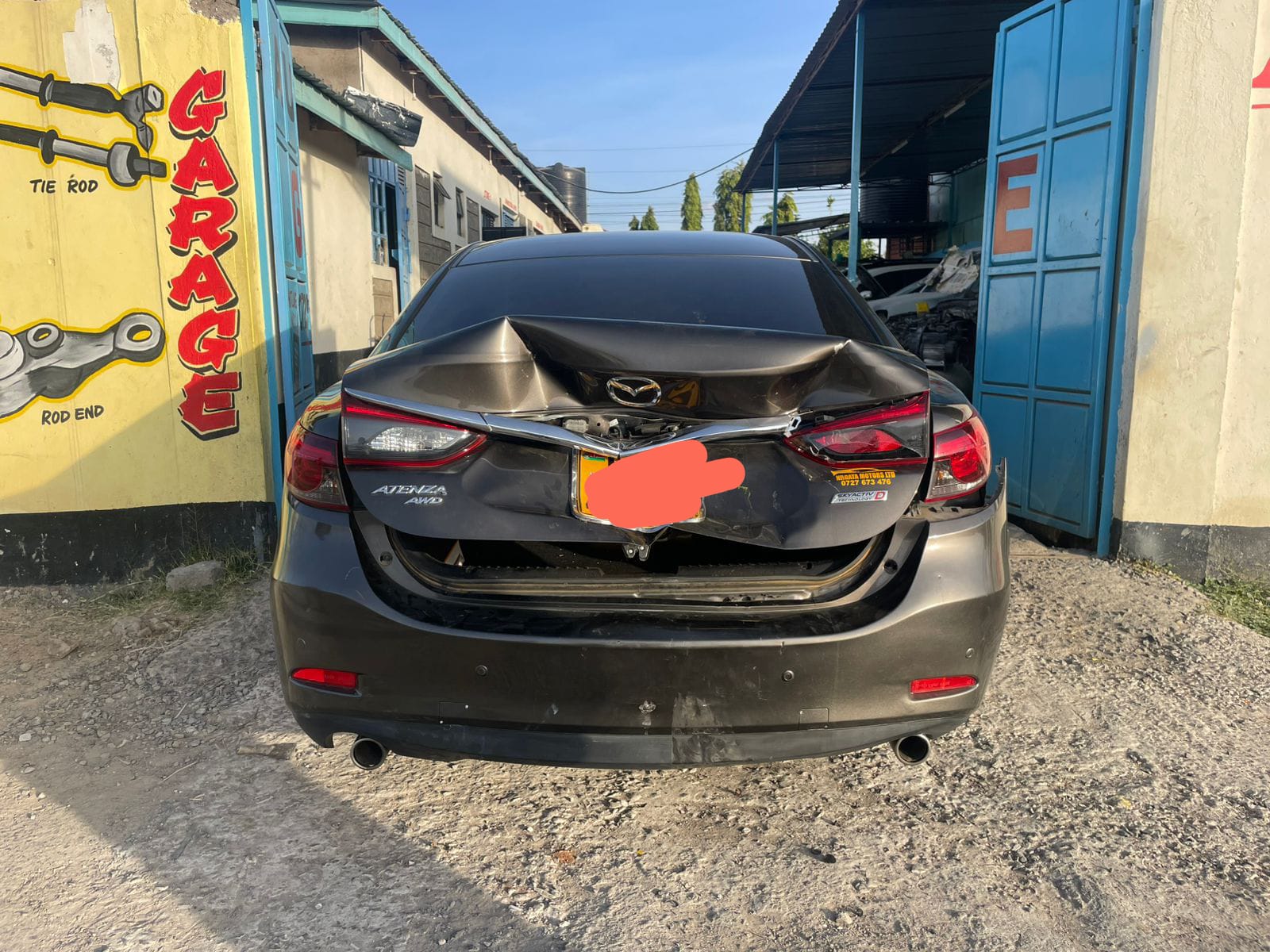 Rear Collision Restoration — Mazda Atenza — before